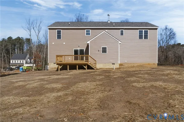 a view of a house with a yard and garage