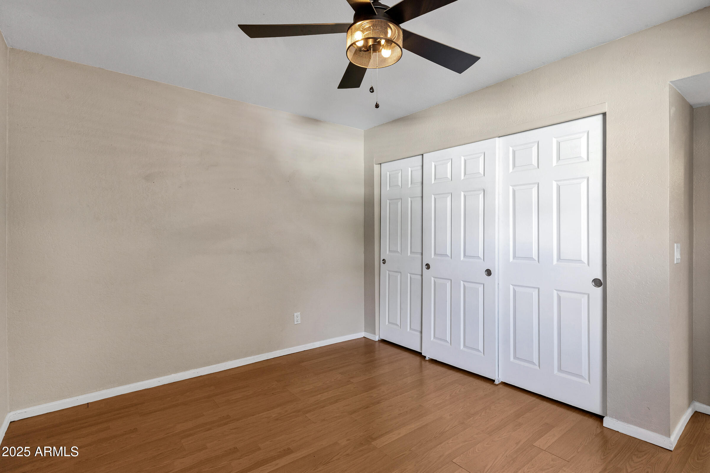 1402 East Guadalupe Road, Unit 248 Tempe, AZ 85283 - Photo 13 of 27 wooden floor in an empty room