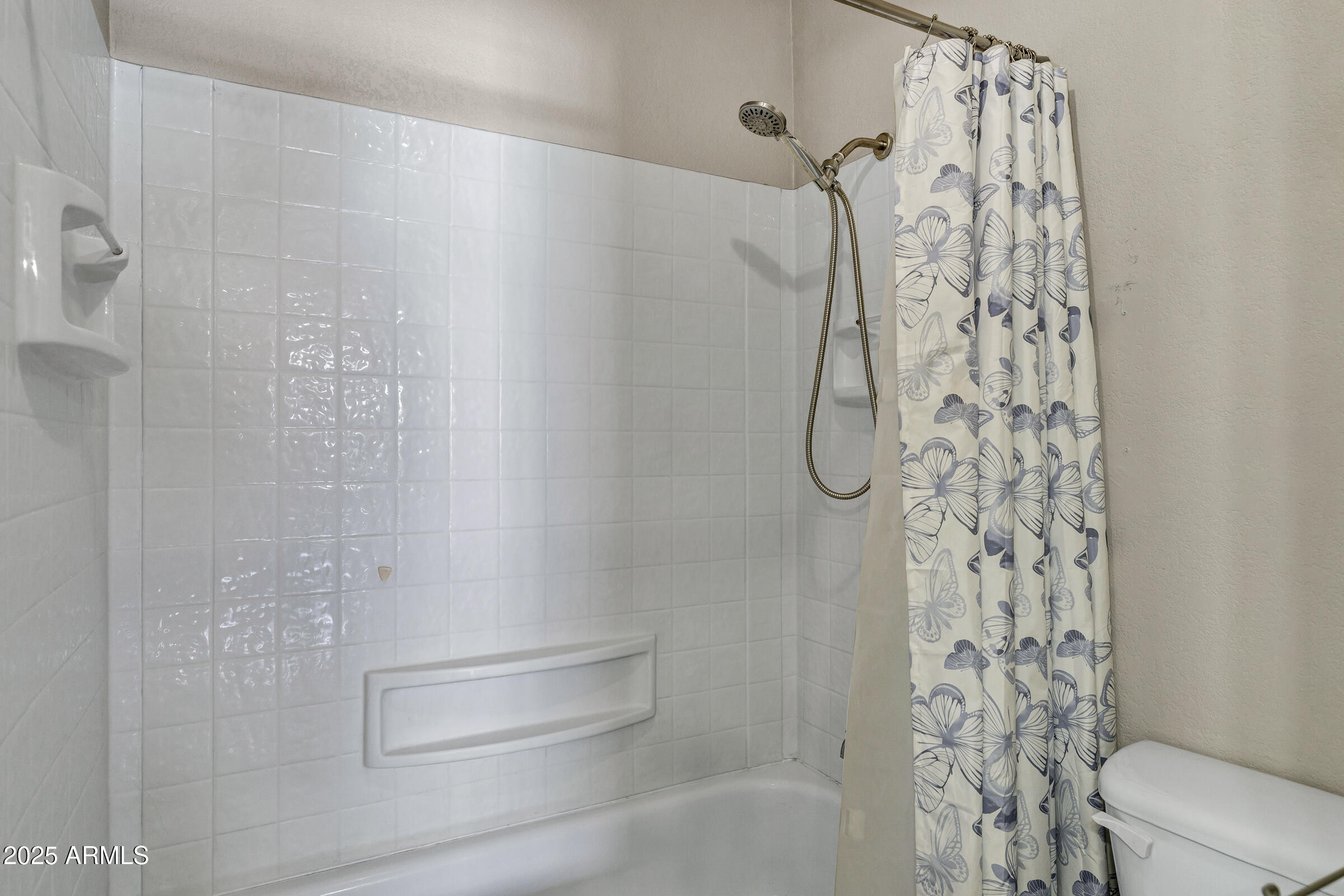1402 East Guadalupe Road, Unit 248 Tempe, AZ 85283 - Photo 18 of 27 a bathroom with a shower curtain