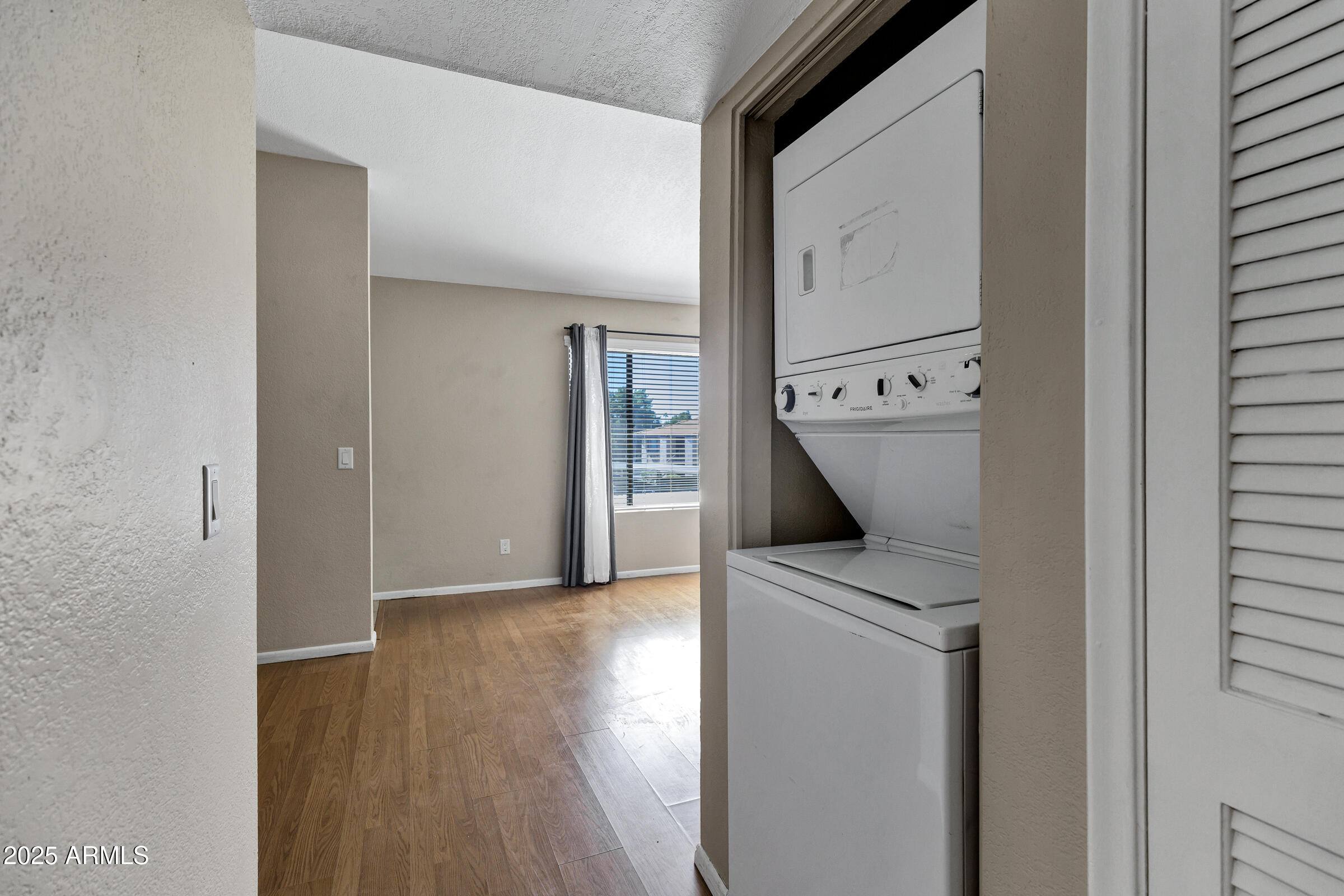 1402 East Guadalupe Road, Unit 248 Tempe, AZ 85283 - Photo 20 of 27 a view of hallway with stairs and wooden floor