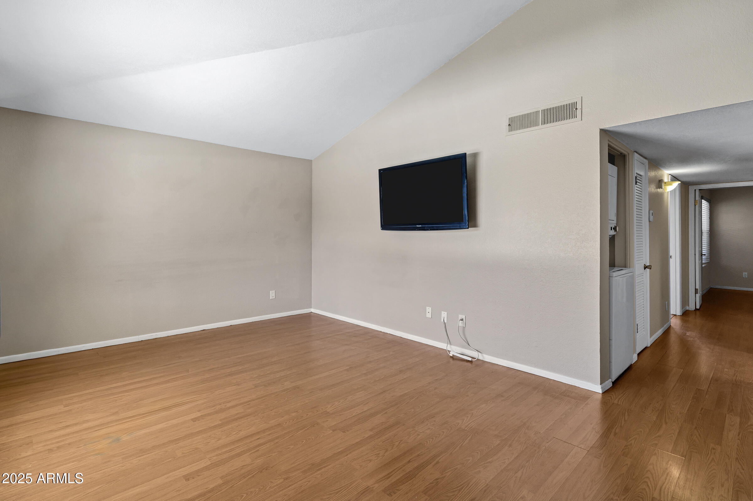1402 East Guadalupe Road, Unit 248 Tempe, AZ 85283 - Photo 4 of 27 a view of a livingroom with wooden floor