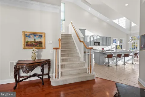 a view of a dining room with furniture and windows
