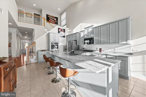 a living room with furniture fireplace and flat screen tv