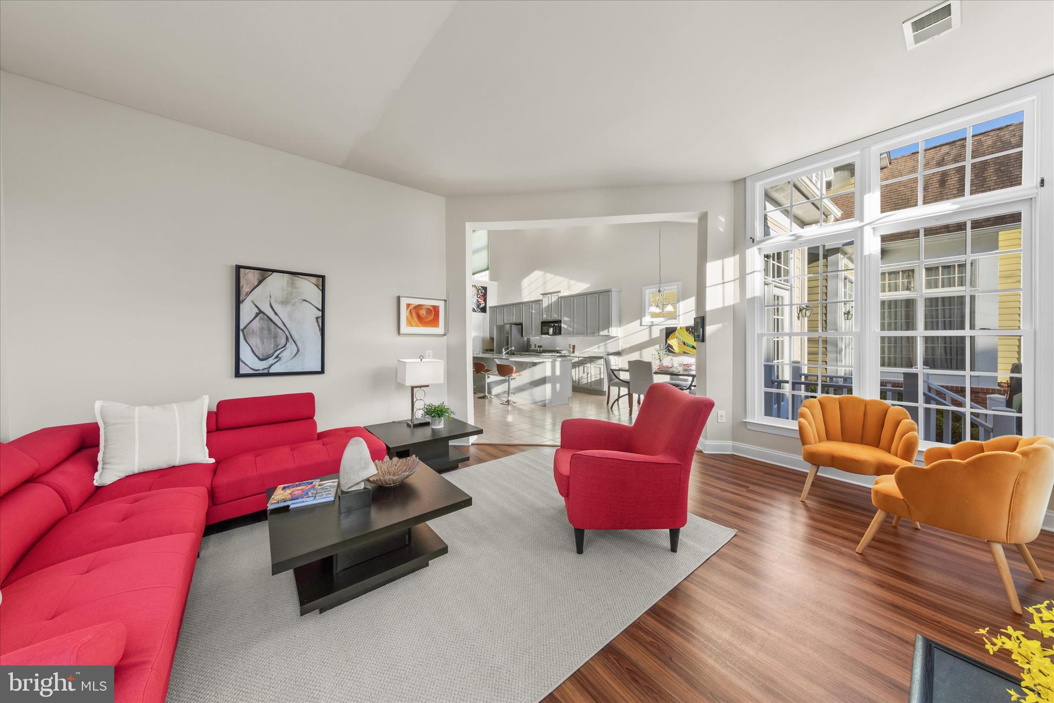 33067 Secluded Path, Unit 125 Millsboro, DE 19966 - Photo 27 of 64 a living room with furniture and a large window