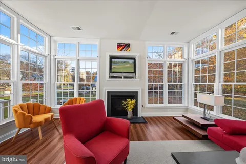 a living room with furniture and a table