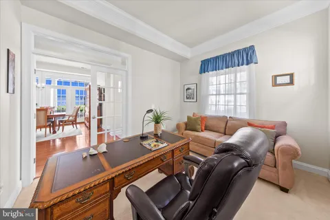 a living room with furniture and a couch