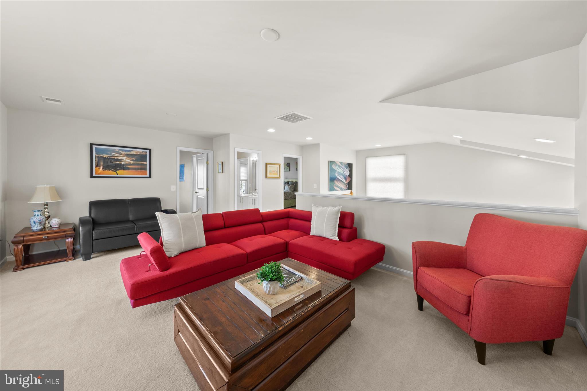 33067 Secluded Path, Unit 125 Millsboro, DE 19966 - Photo 42 of 64 a living room with furniture and a couch