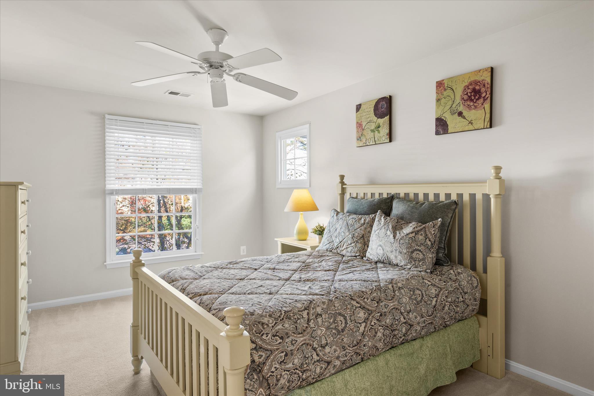 33067 Secluded Path, Unit 125 Millsboro, DE 19966 - Photo 43 of 64 a bedroom with a bed and window