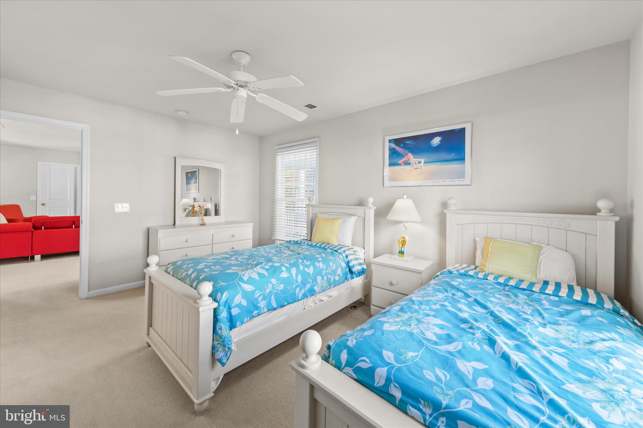 33067 Secluded Path, Unit 125 Millsboro, DE 19966 - Photo 50 of 64 a bedroom with two beds and window