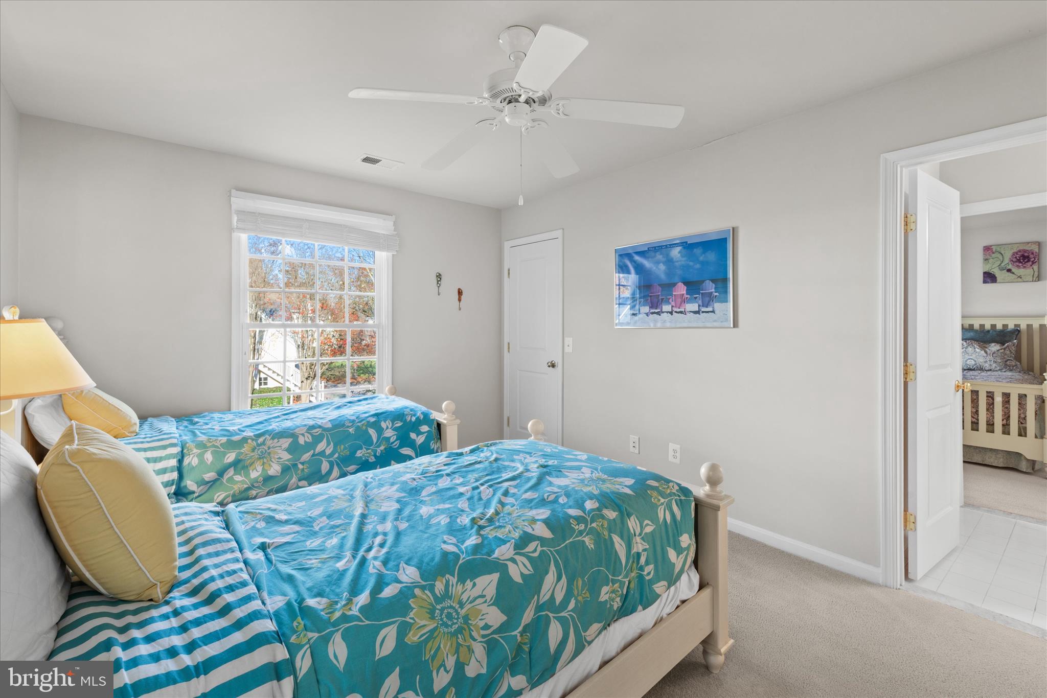 33067 Secluded Path, Unit 125 Millsboro, DE 19966 - Photo 51 of 64 a bedroom with a bed and window