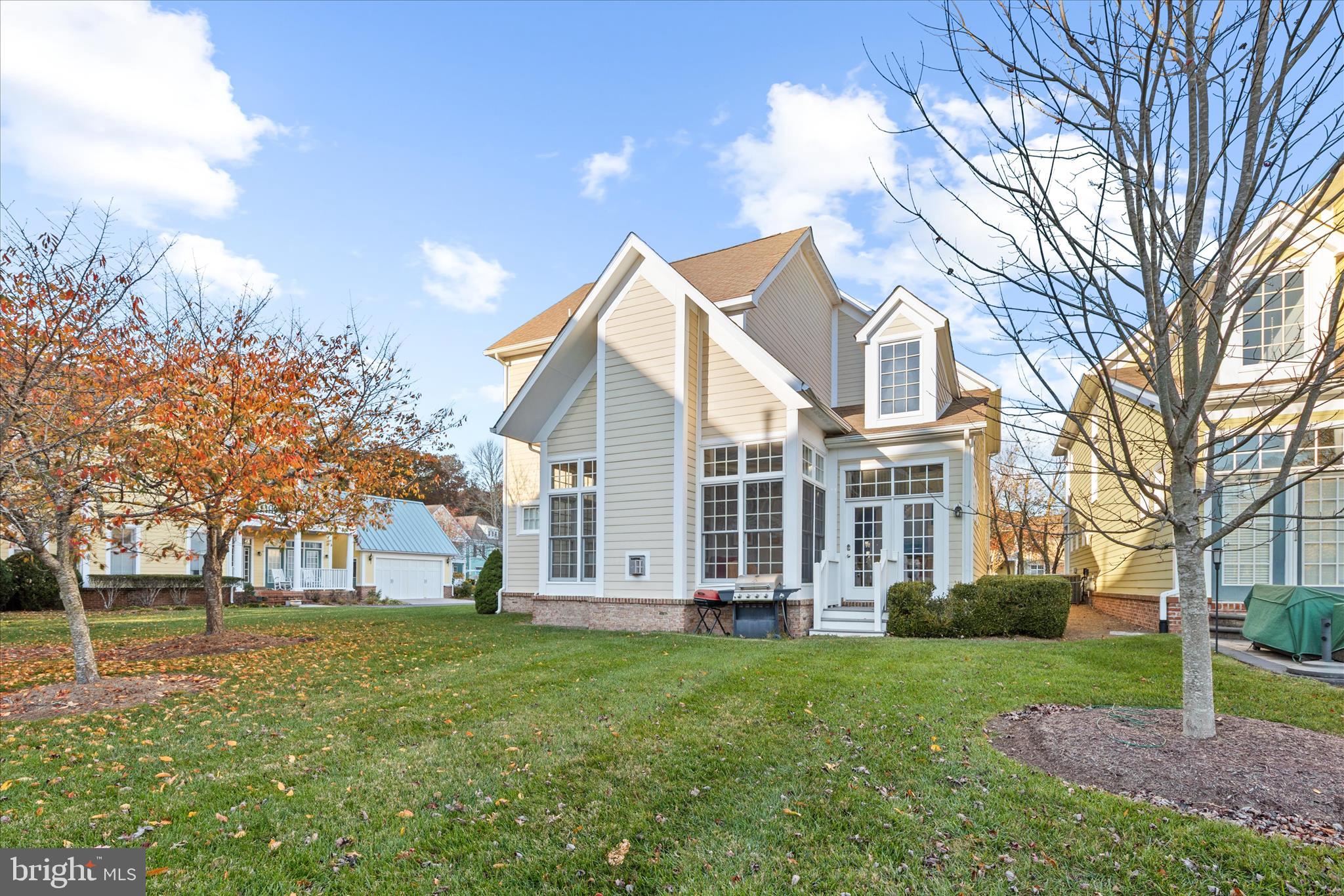 33067 Secluded Path, Unit 125 Millsboro, DE 19966 - Photo 64 of 64 a view of a house with a backyard