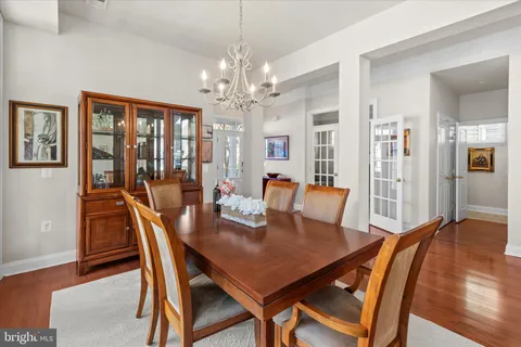 a kitchen with stainless steel appliances granite countertop a stove and cabinets