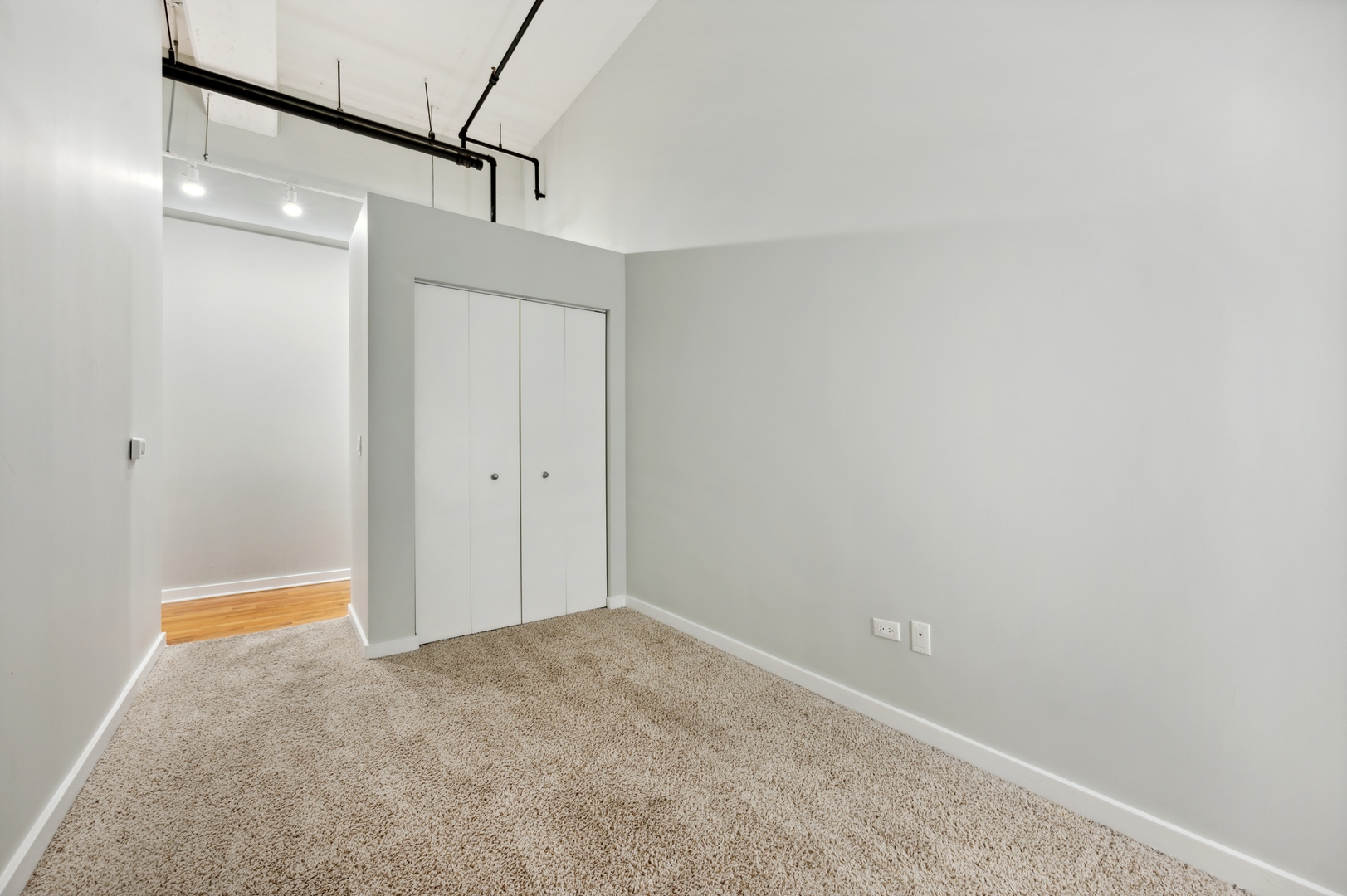 1224 West Van Buren Street, Unit 300 Chicago, IL 60607 - Photo 13 of 18 a view of a room with an empty space