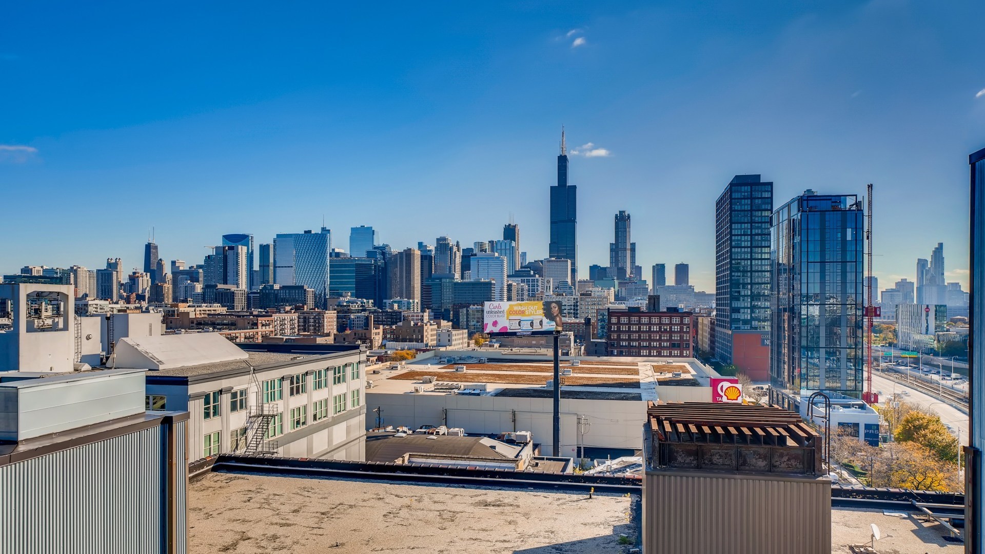 1224 West Van Buren Street, Unit 300 Chicago, IL 60607 - Photo 17 of 18 a view of a city with tall buildings