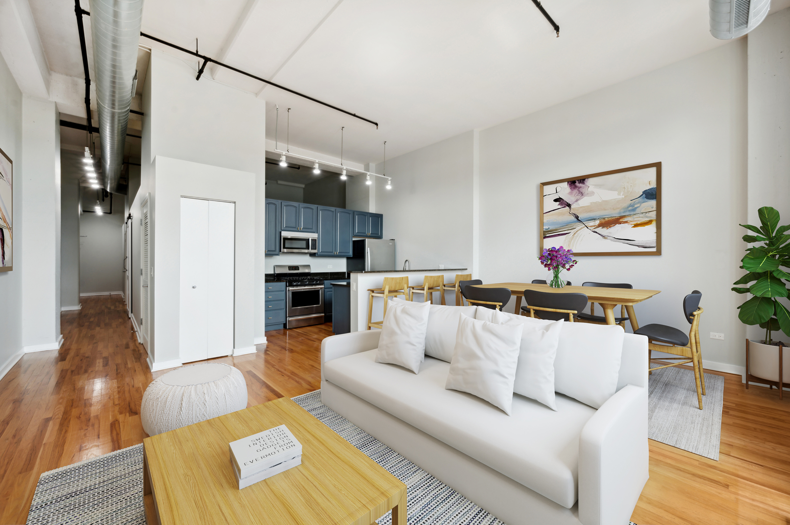 1224 West Van Buren Street, Unit 300 Chicago, IL 60607 - Photo 3 of 18 a living room with furniture and kitchen view