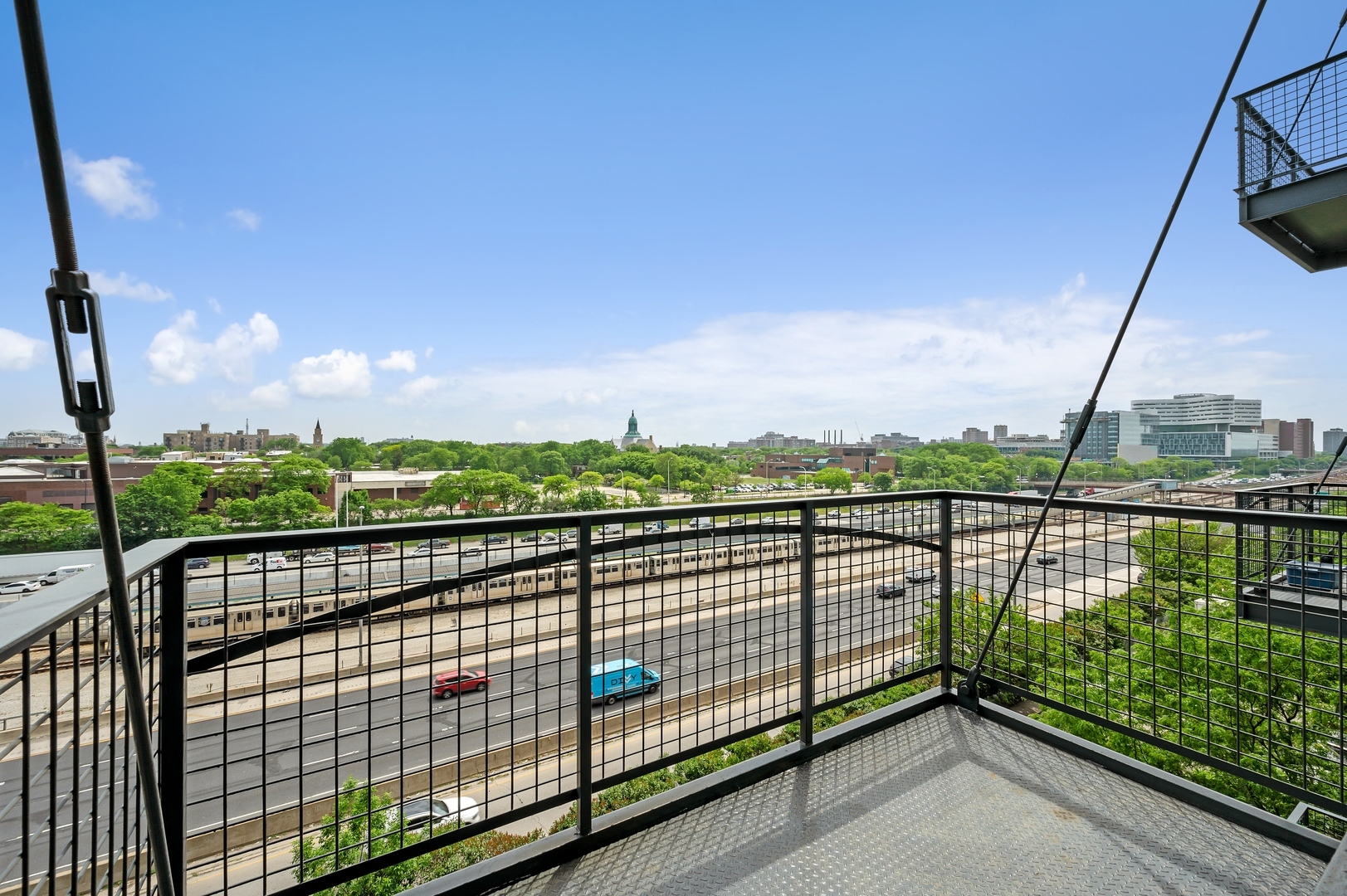 1224 West Van Buren Street, Unit 300 Chicago, IL 60607 - Photo 7 of 18 a view of city from a balcony