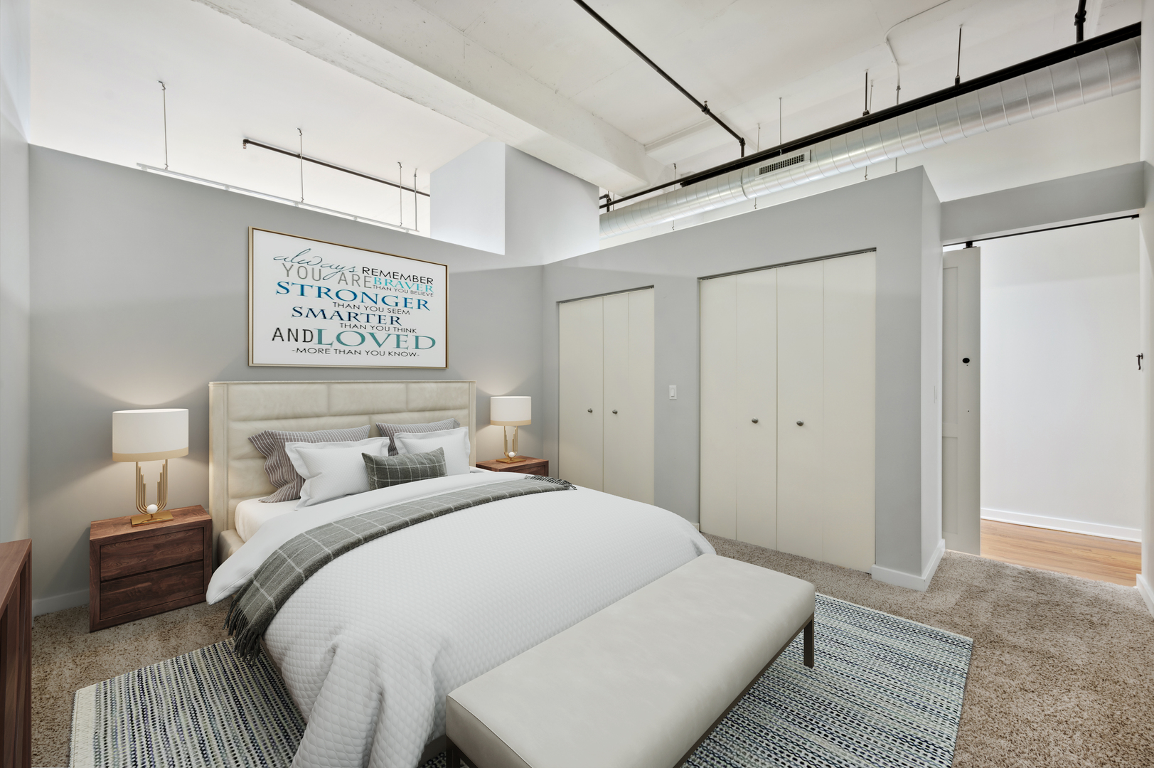 1224 West Van Buren Street, Unit 300 Chicago, IL 60607 - Photo 9 of 18 a bedroom with a bed and a night stand