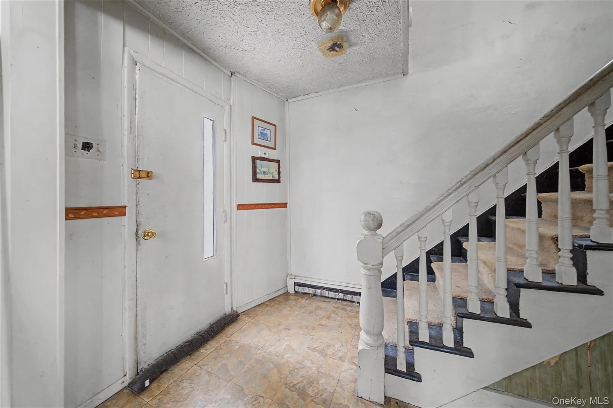 2 Station Hill Road, Unit 4 Ferndale, NY 12734 - Photo 5 of 25 Entrance foyer featuring a textured ceiling and stone finish floors