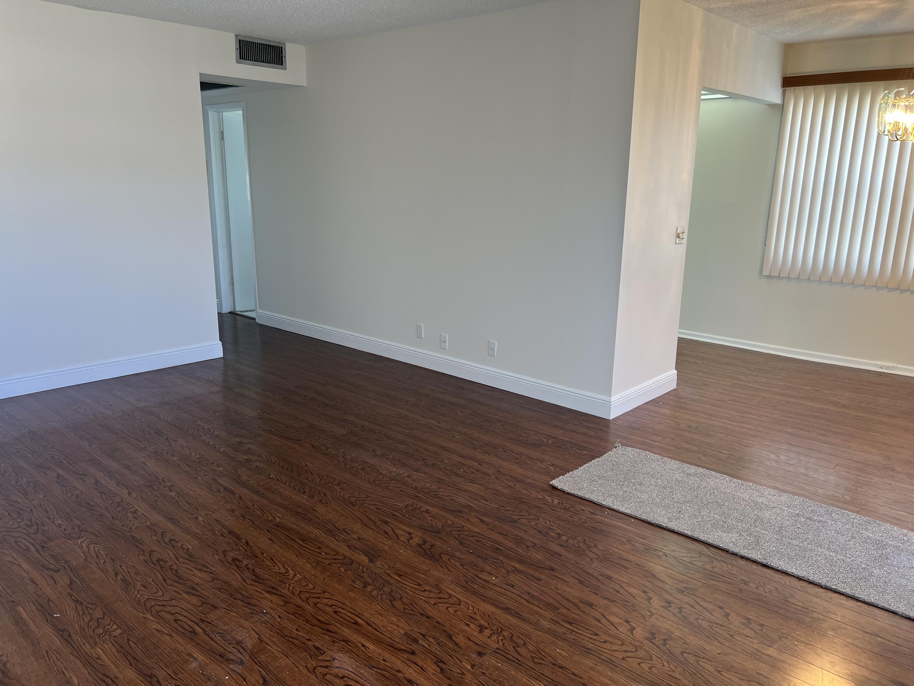 116 Brighton C, Unit 116 Boca Raton, FL 33434 - Photo 7 of 16 LIVING ROOM TO DR
