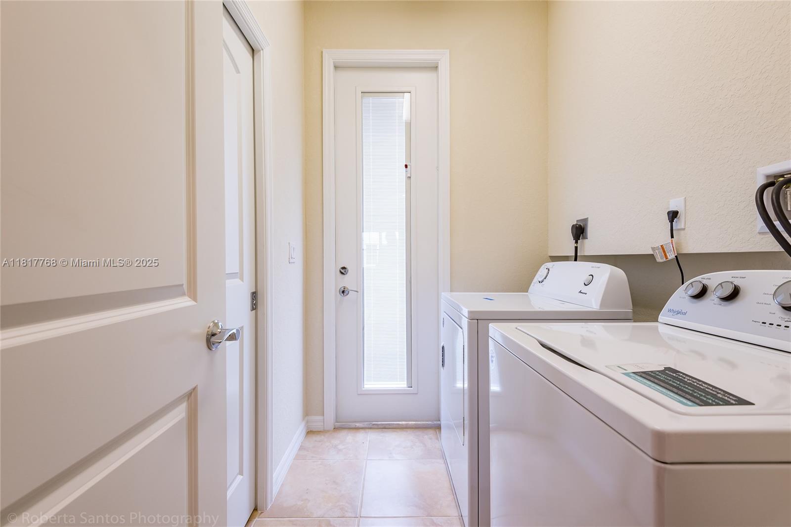 1040 Eucalyptus Drive, Unit 6 Hollywood, FL 33021 - Photo 11 of 41 a utility room with dryer and washer