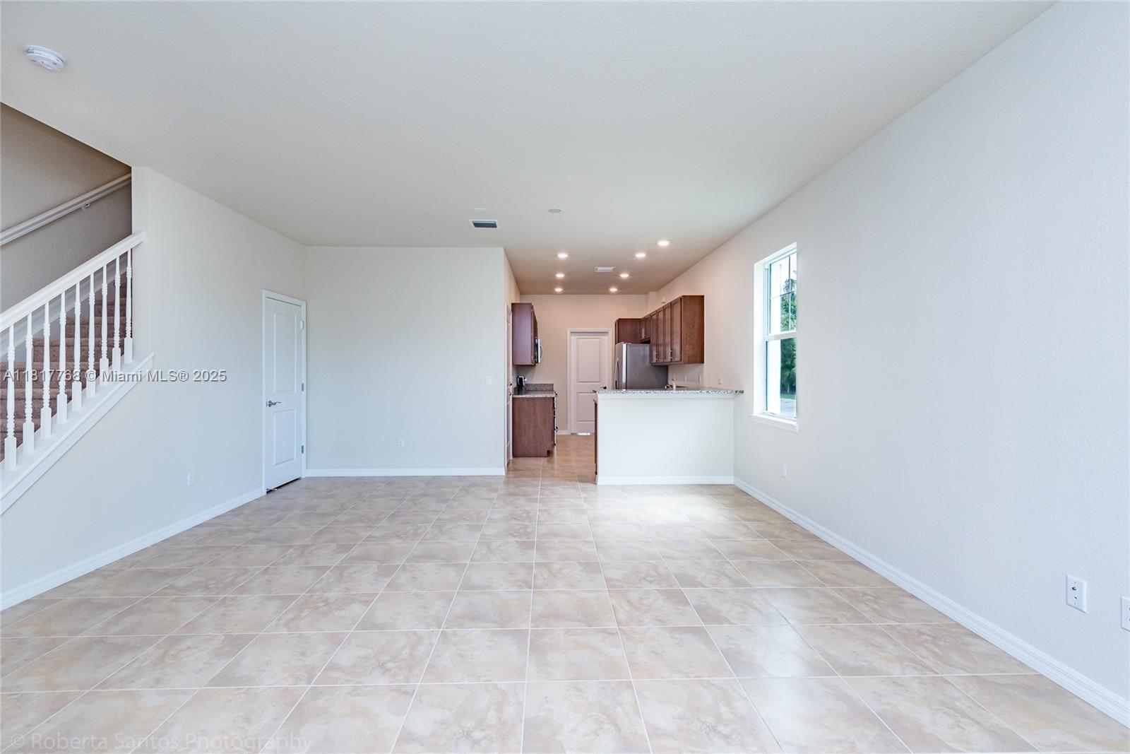 1040 Eucalyptus Drive, Unit 6 Hollywood, FL 33021 - Photo 13 of 41 a view of a kitchen with a sink and a window