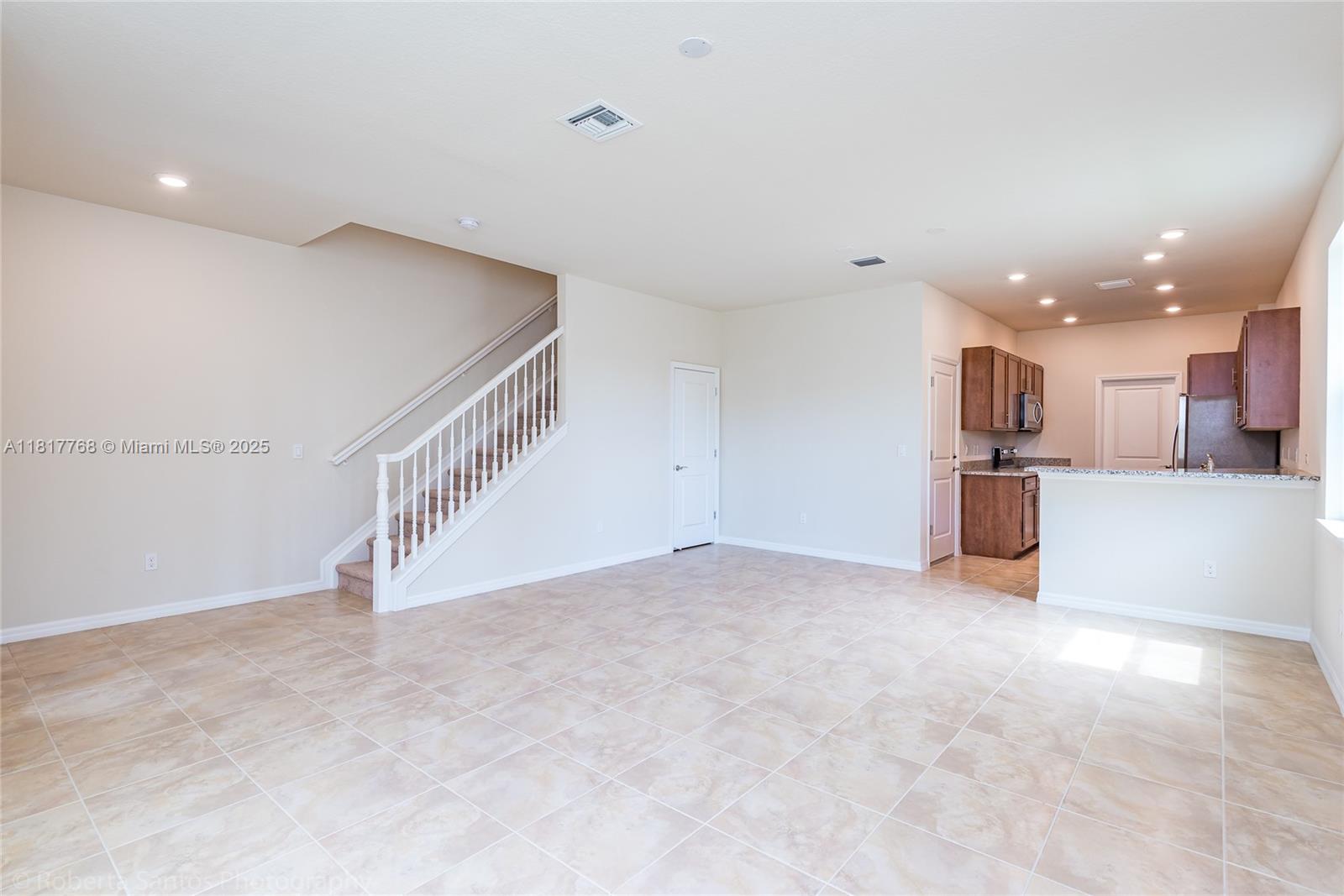 1040 Eucalyptus Drive, Unit 6 Hollywood, FL 33021 - Photo 14 of 41 a view of a kitchen with a sink and cabinets