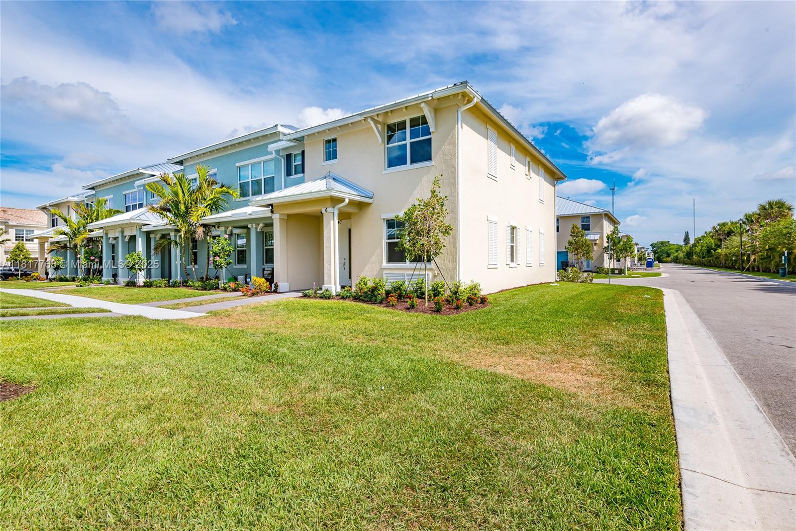 1040 Eucalyptus Drive, Unit 6 Hollywood, FL 33021 - Photo 2 of 41 a front view of house with yard and green space