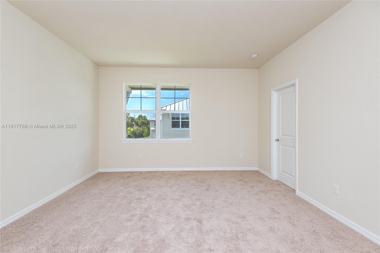 1040 Eucalyptus Drive, Unit 6 Hollywood, FL 33021 - Photo 23 of 41 an empty room with windows