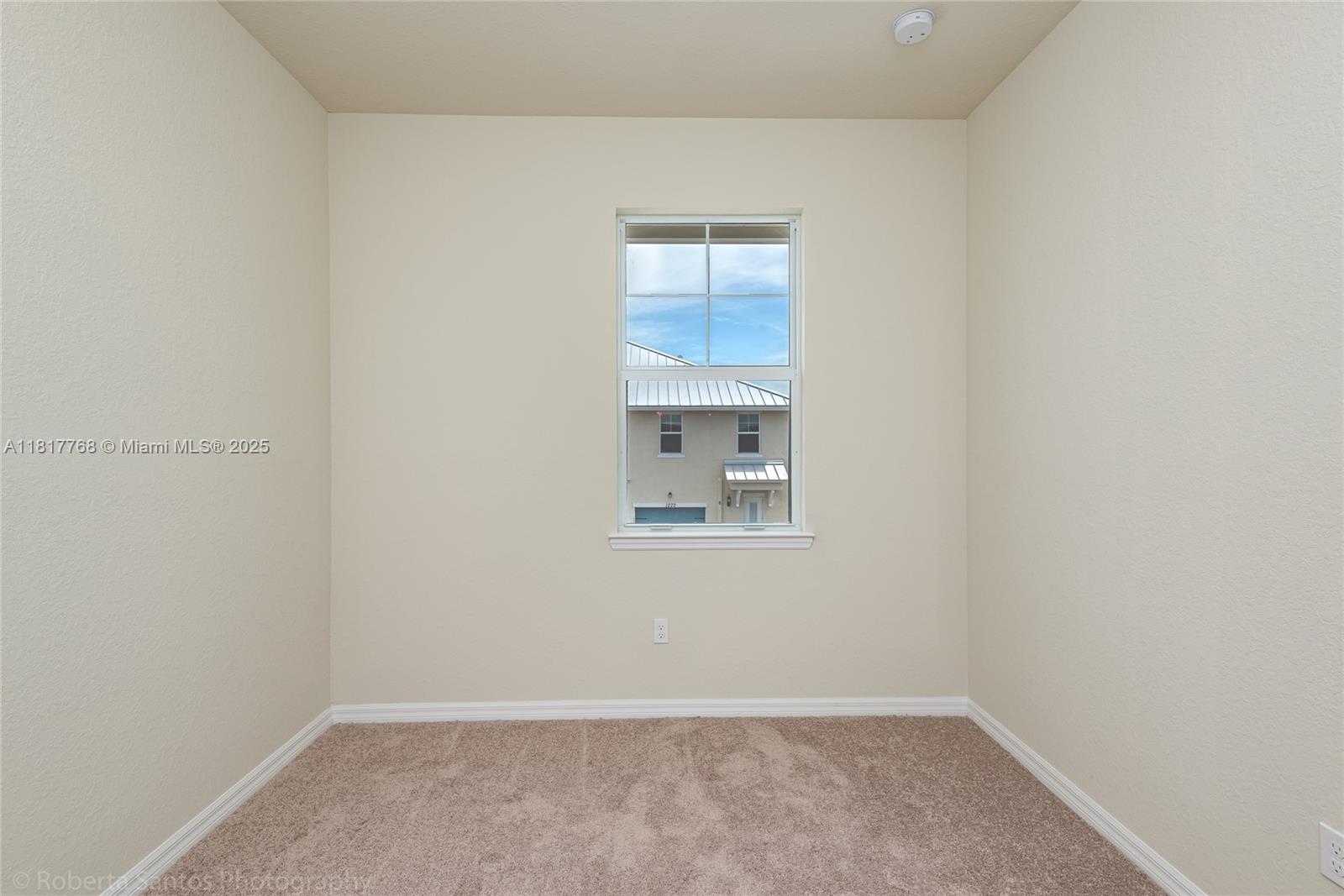 1040 Eucalyptus Drive, Unit 6 Hollywood, FL 33021 - Photo 25 of 41 a view of an empty room with a window