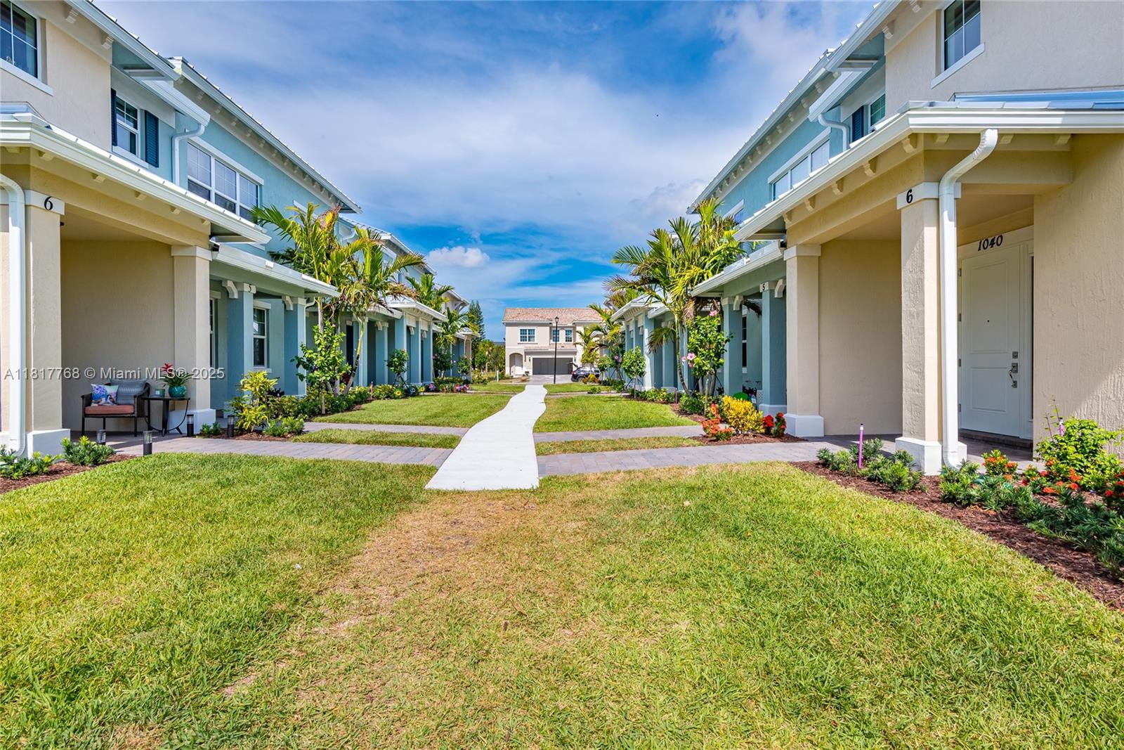 1040 Eucalyptus Drive, Unit 6 Hollywood, FL 33021 - Photo 3 of 41 a view of a building with a swimming pool