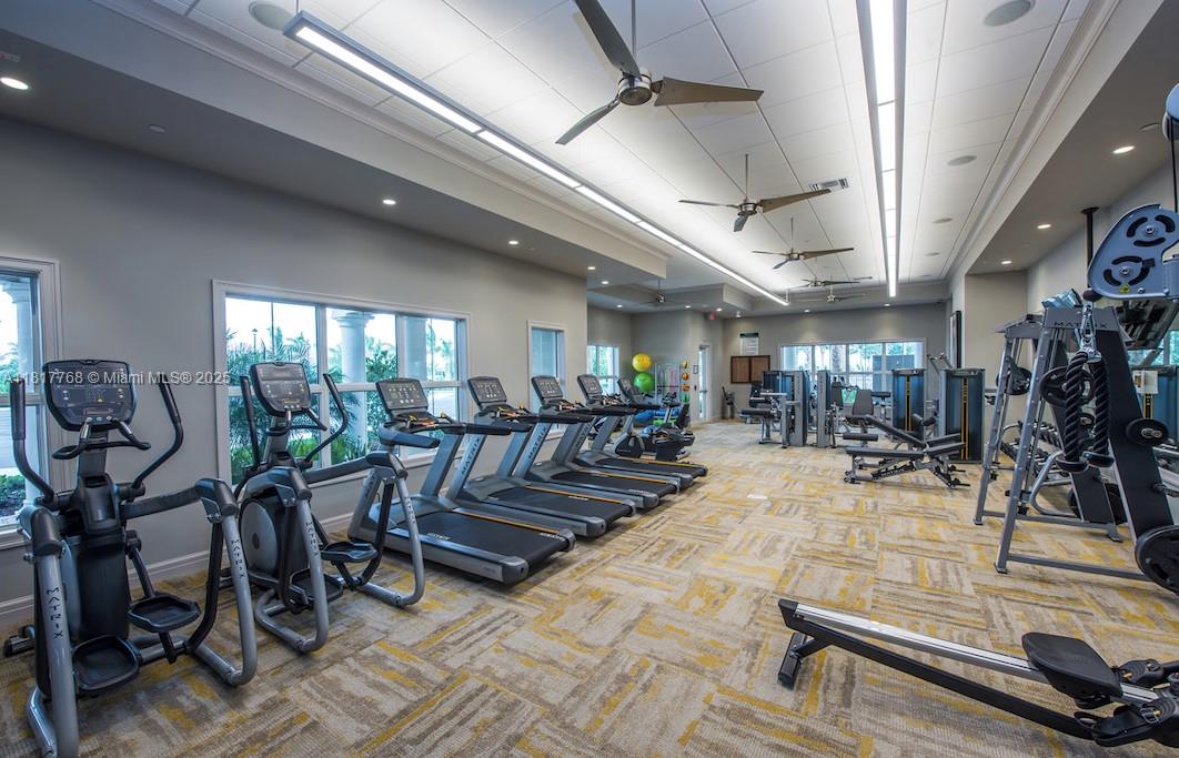 1040 Eucalyptus Drive, Unit 6 Hollywood, FL 33021 - Photo 39 of 41 a view of a room with gym equipment