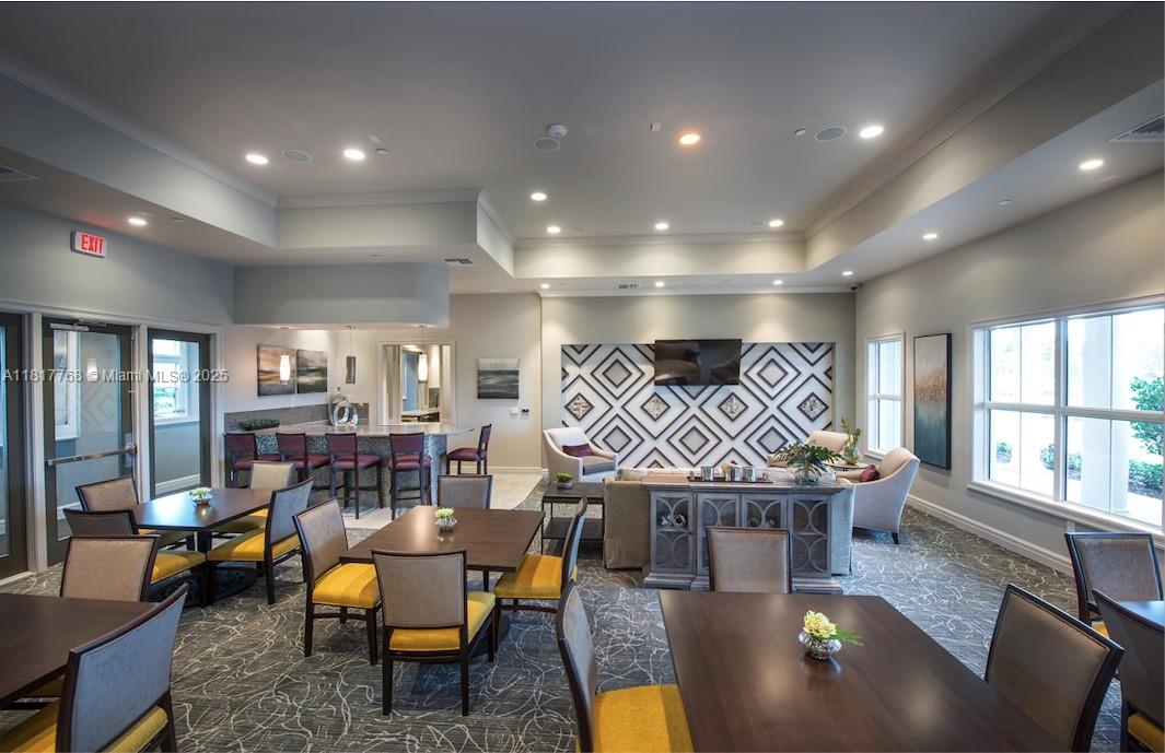 1040 Eucalyptus Drive, Unit 6 Hollywood, FL 33021 - Photo 40 of 41 a living room with furniture and wooden floor