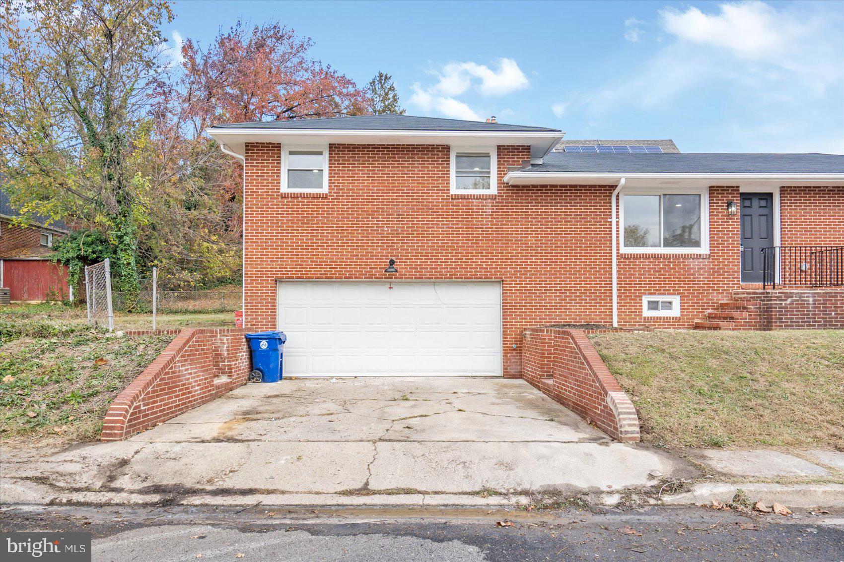 5000 Anthony Avenue Baltimore, MD 21206 - Photo 5 of 45 Side of home with drive way and attached garage