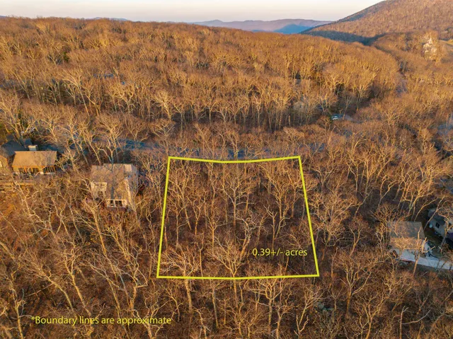 a view of an ocean in the sunset