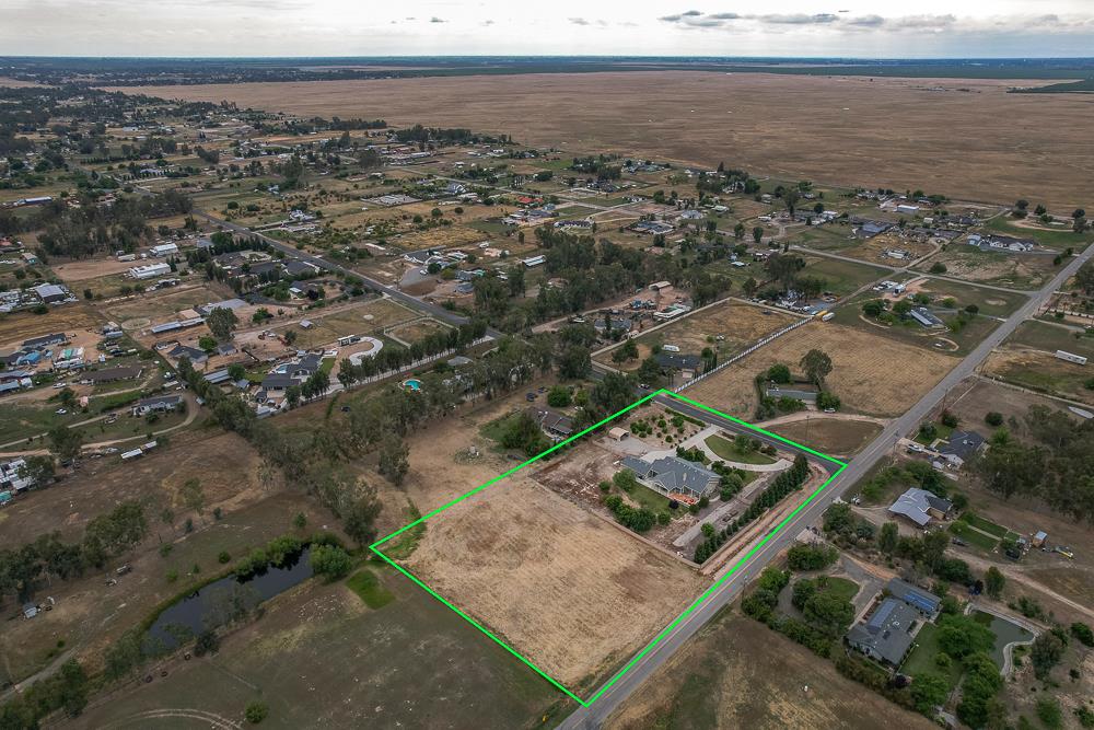17465 Monreal Road Madera, CA 93636 - Photo 57 of 59 an aerial view of multiple house