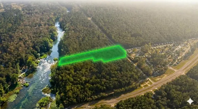 a view of a garden with a building