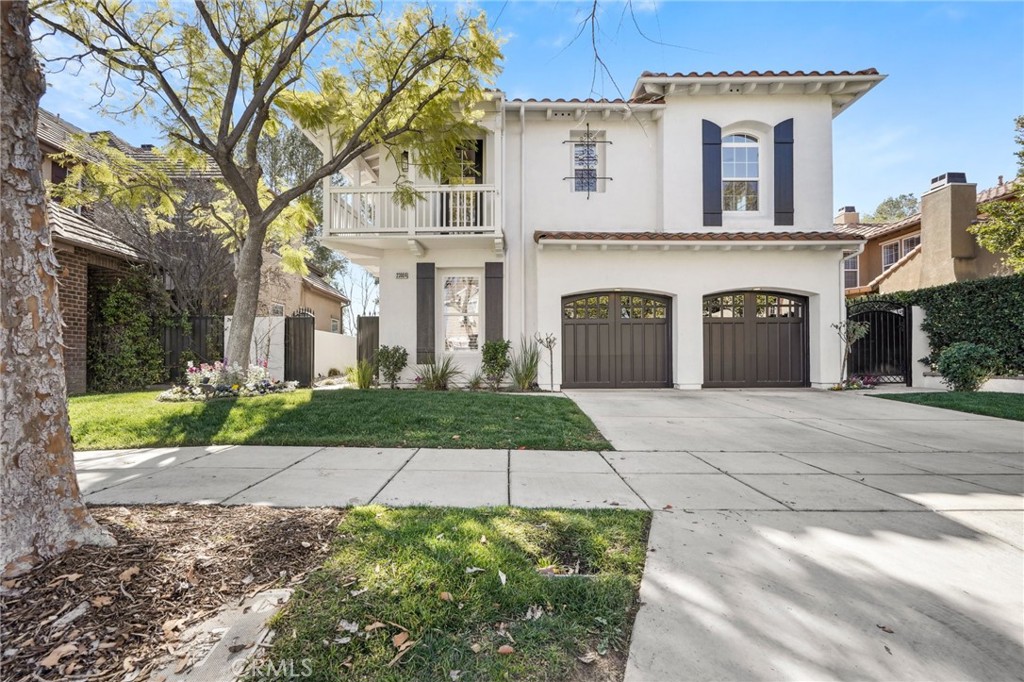 23904 Lakeside Road Valencia, CA 91355 - Photo 1 of 1 a front view of a house with yard and parking