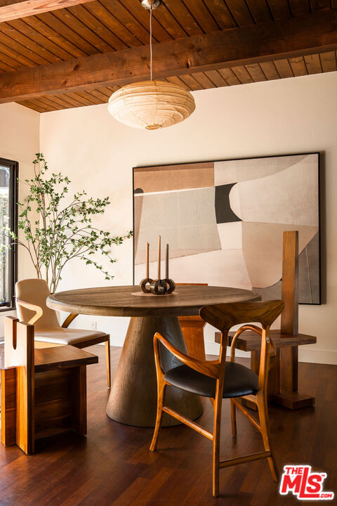 2996 Hyperion Avenue Los Angeles, CA 90027 - Photo 15 of 40 a table and chairs in a room next to a window