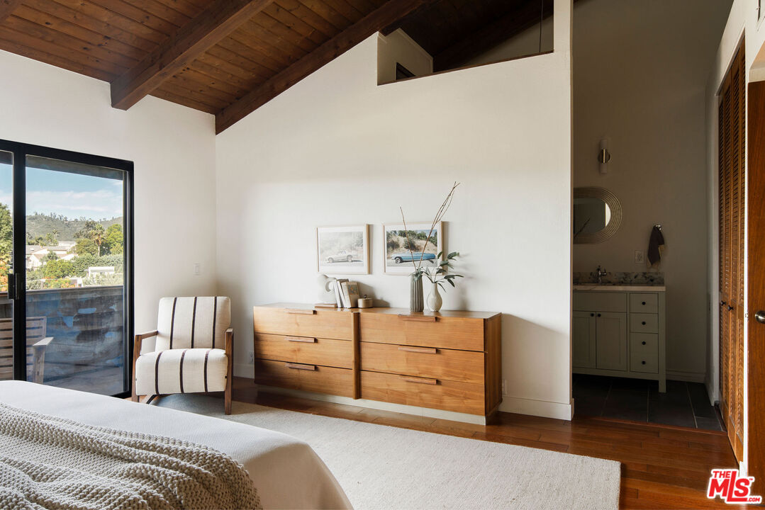 2996 Hyperion Avenue Los Angeles, CA 90027 - Photo 19 of 40 a bedroom with a bed and a dresser