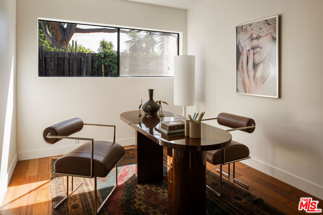 2996 Hyperion Avenue Los Angeles, CA 90027 - Photo 33 of 40 a view of a workspace with furniture and a window