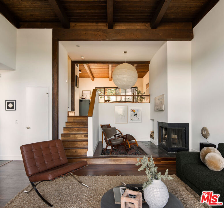 2996 Hyperion Avenue Los Angeles, CA 90027 - Photo 7 of 40 a living room with furniture and a fireplace