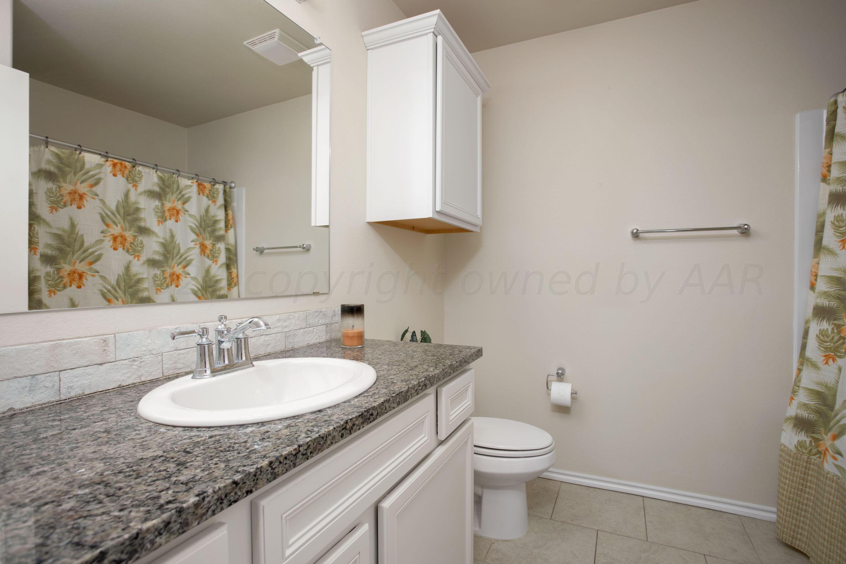 9506 Cagle Drive Amarillo, TX 79119 - Photo 15 of 18 Bathroom 2