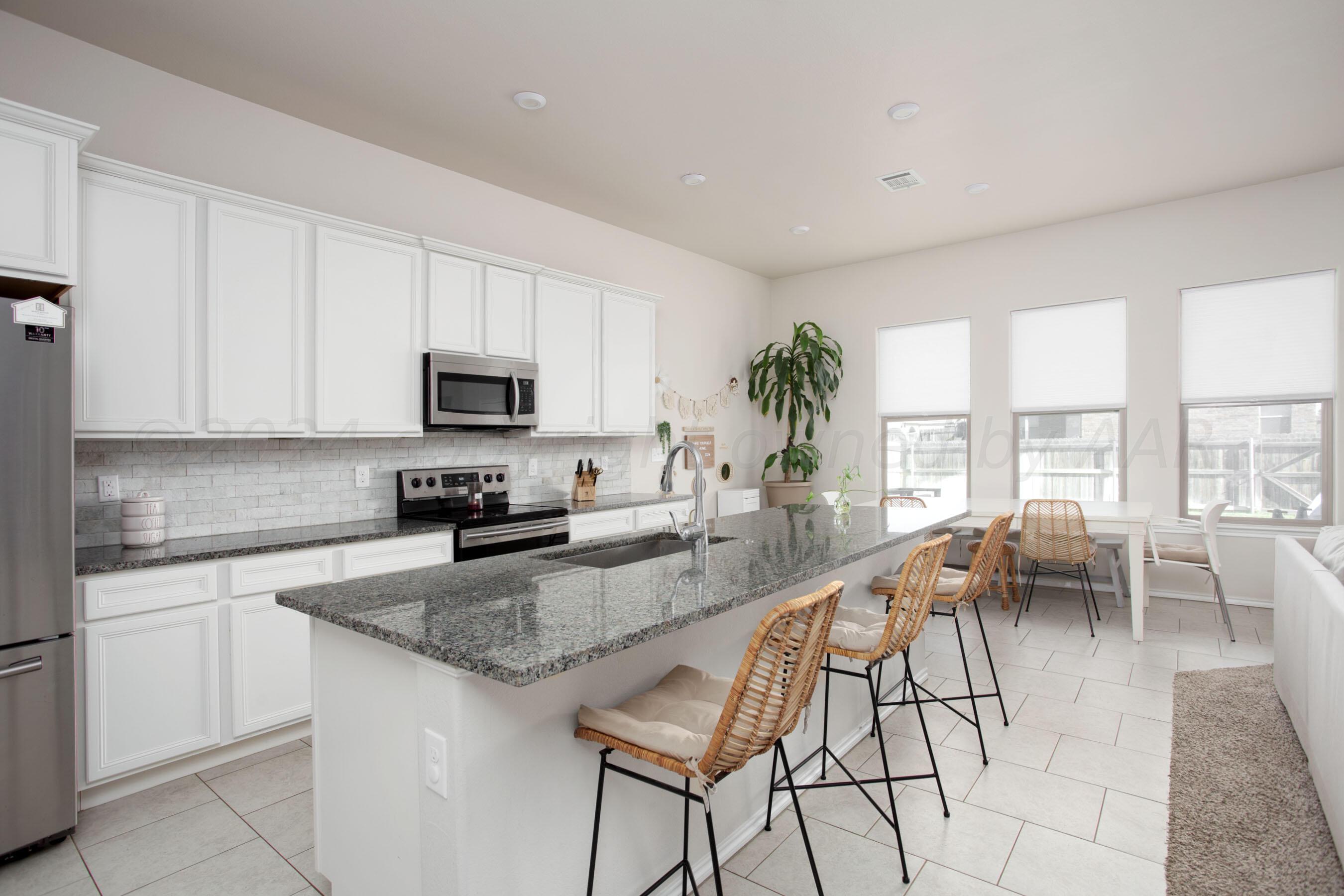 9506 Cagle Drive Amarillo, TX 79119 - Photo 7 of 18 Kitchen View 1