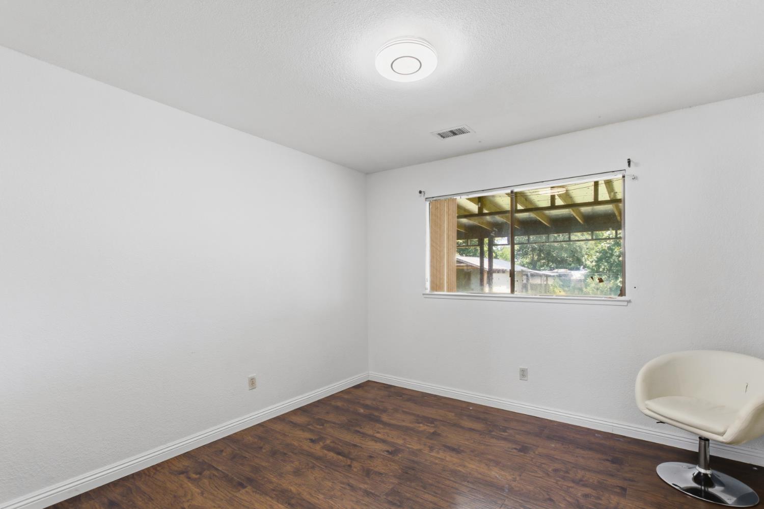 7208 7th Street Rio Linda, CA 95673 - Photo 18 of 41 an empty room with a window