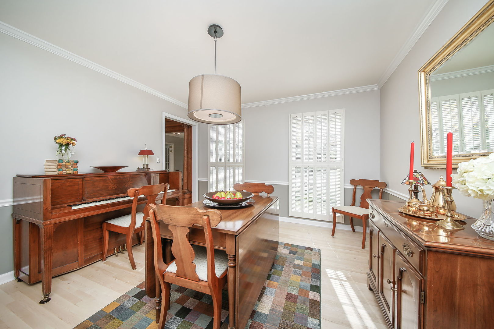 230 Hill Road Willowbrook, IL 60527 - Photo 13 of 39 a view of a dining room with furniture window and wooden floor