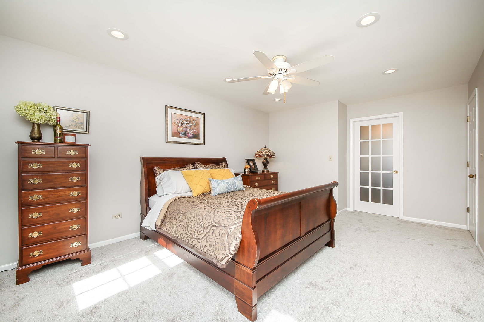 230 Hill Road Willowbrook, IL 60527 - Photo 16 of 39 a bed room with a bed and a window