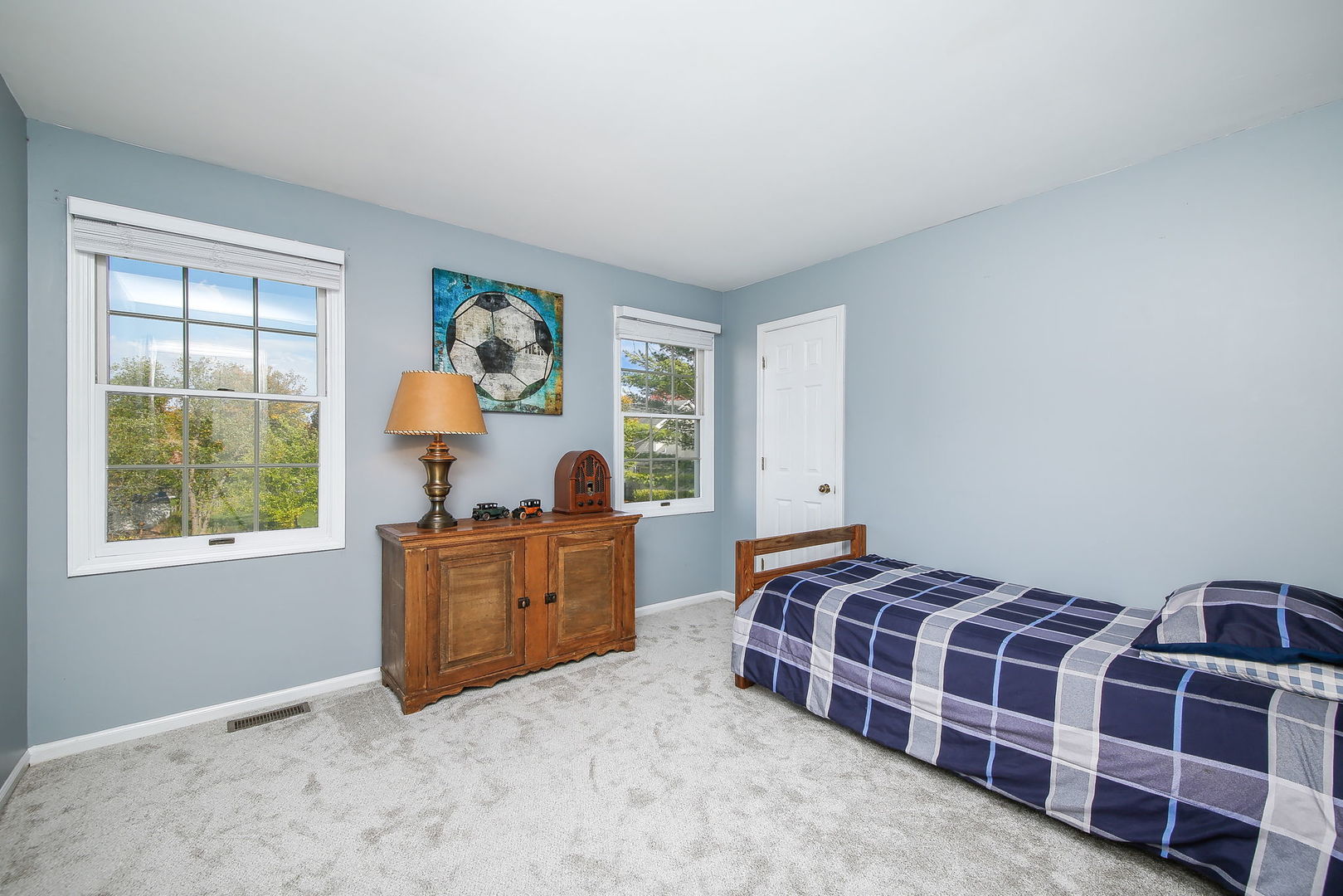 230 Hill Road Willowbrook, IL 60527 - Photo 20 of 39 a bedroom with furniture and windows
