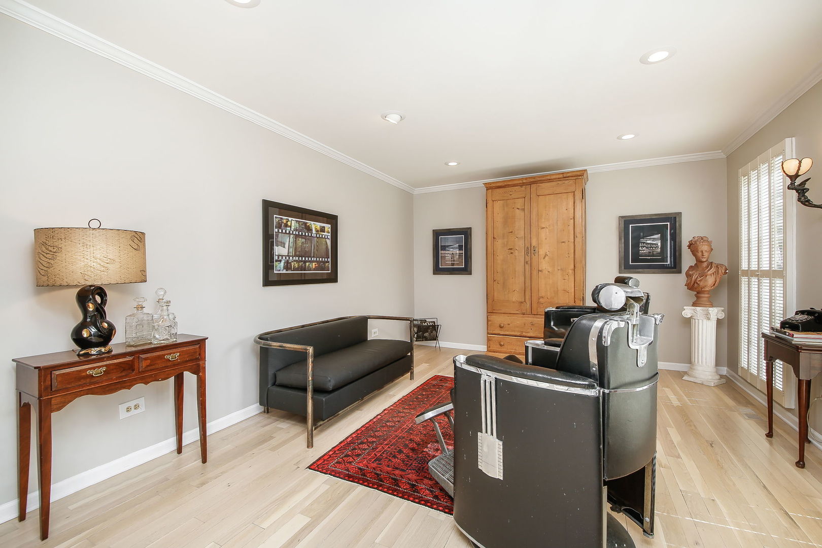 230 Hill Road Willowbrook, IL 60527 - Photo 4 of 39 a living room with furniture and a flat screen tv