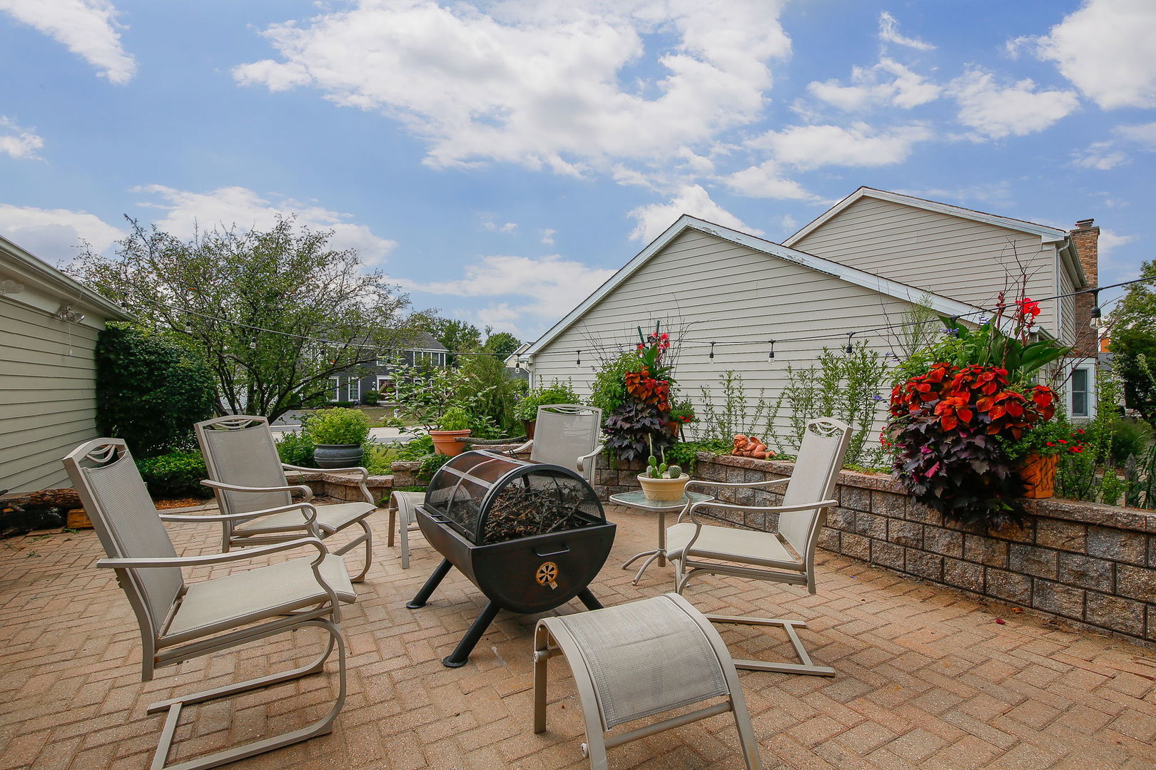 230 Hill Road Willowbrook, IL 60527 - Photo 34 of 39 a view of house with backyard and sitting area