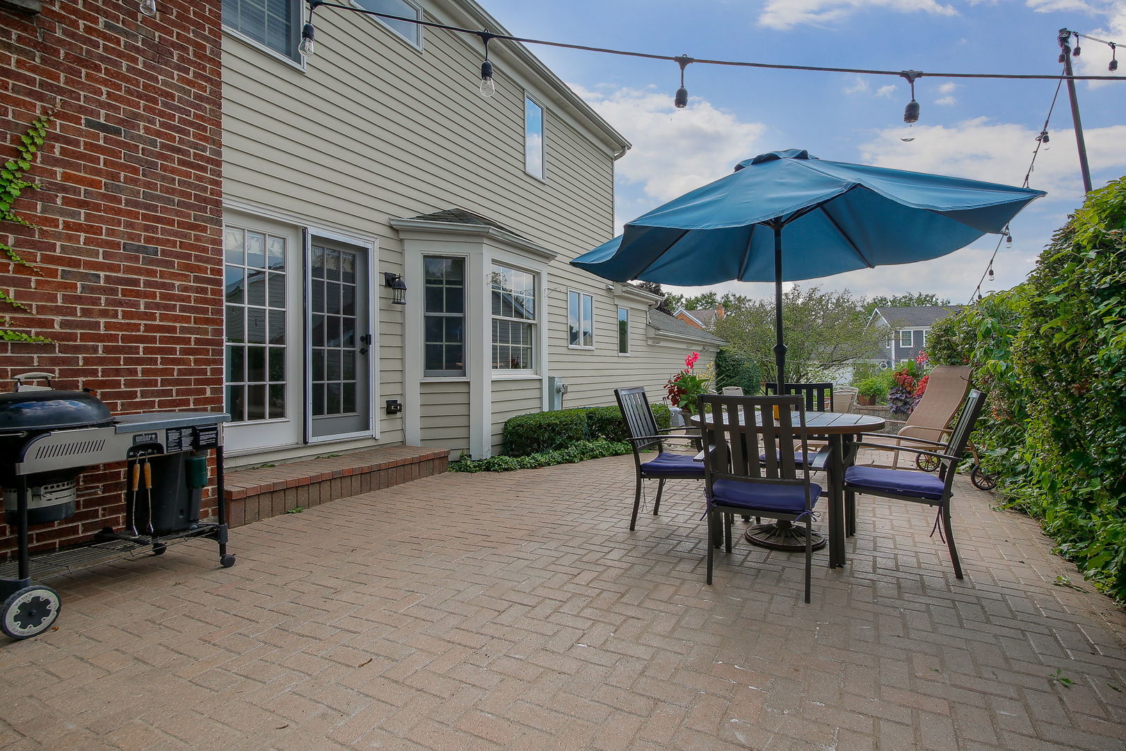 230 Hill Road Willowbrook, IL 60527 - Photo 36 of 39 a view of a house with backyard and sitting area
